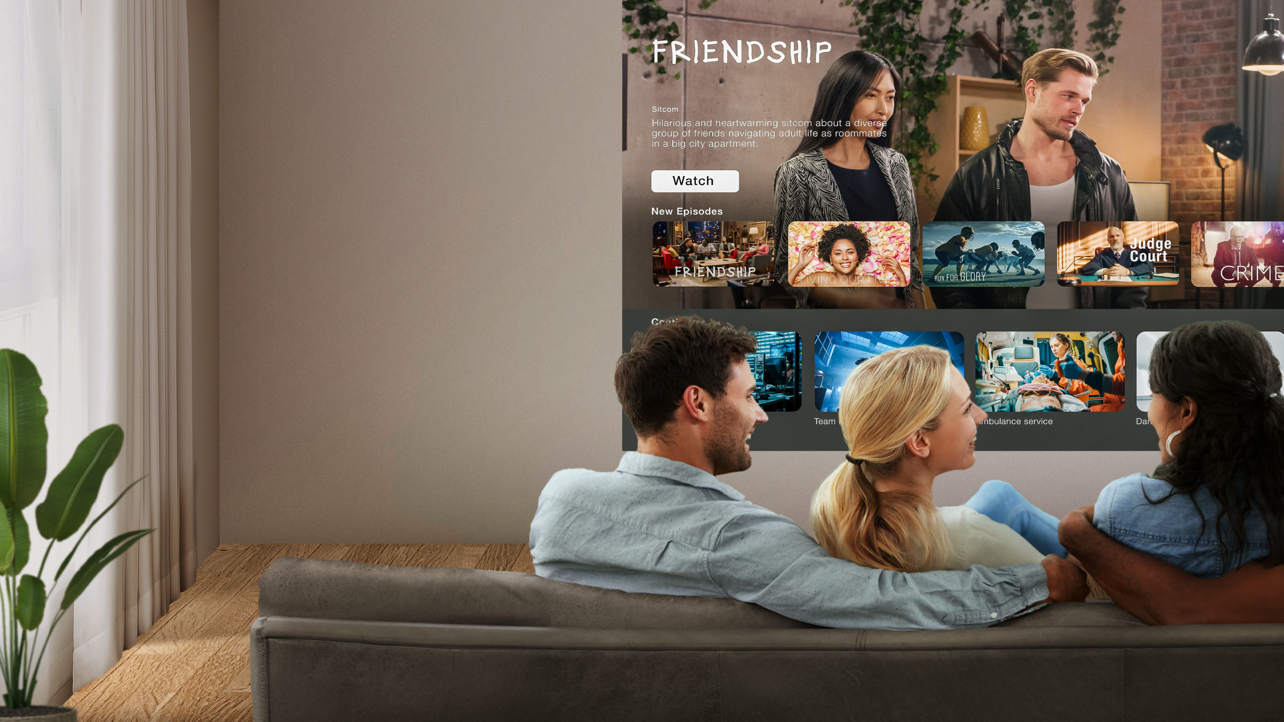 Friends watching Netflix and YouTube via built-in Google TV on BenQ TK705STi home entertainment projector