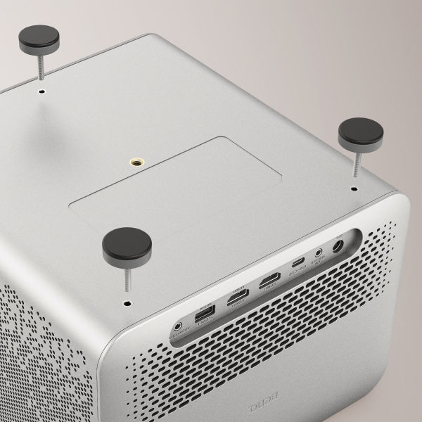 BenQ TK705STi home entertainment projector integrated ceiling mount holes reduce clutter underneath.