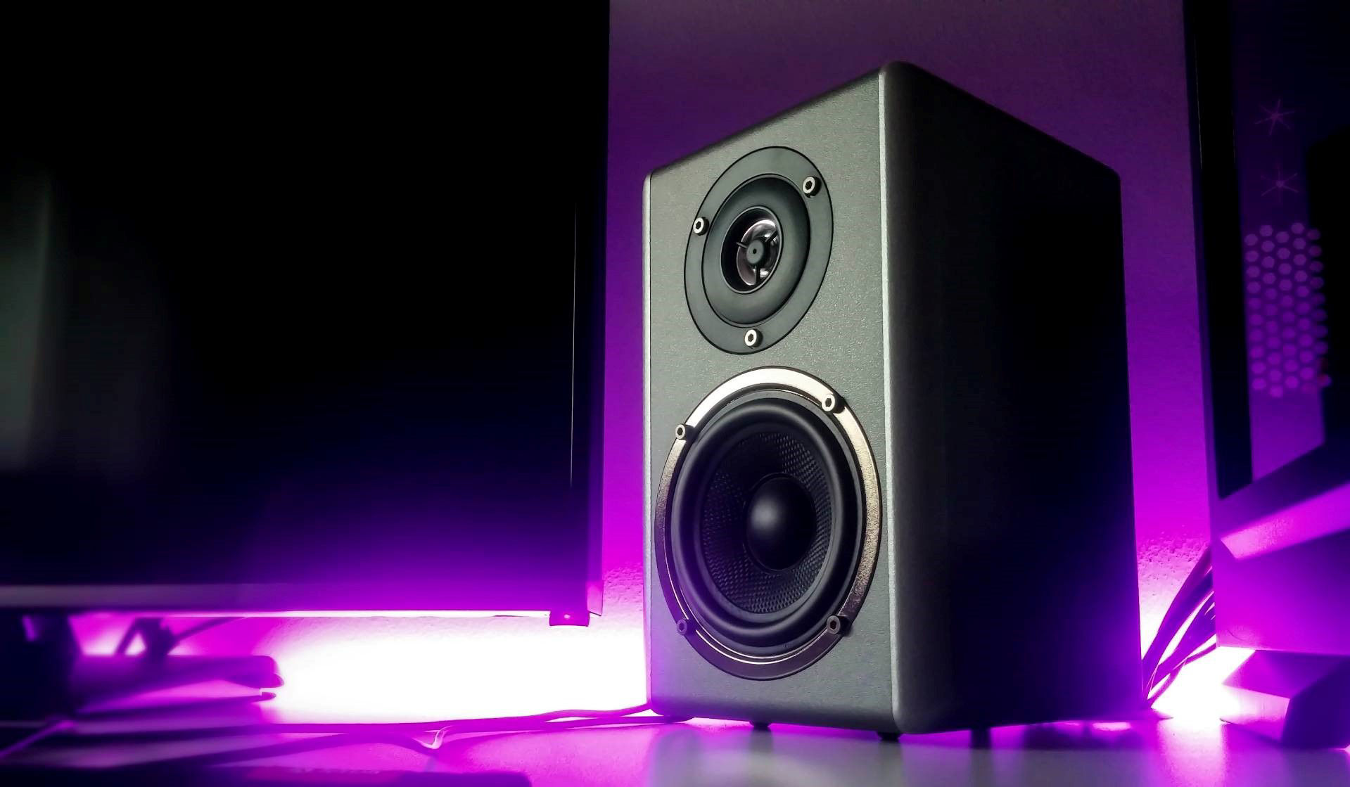 speaker with rgb lighting in the background