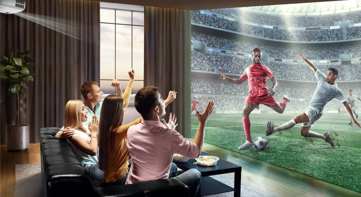 A group of people is enjoying watching football game with 4K HDR television screen.