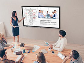 A group of office workers are having meeting with the screen mirrored between IFP and mobile devices.