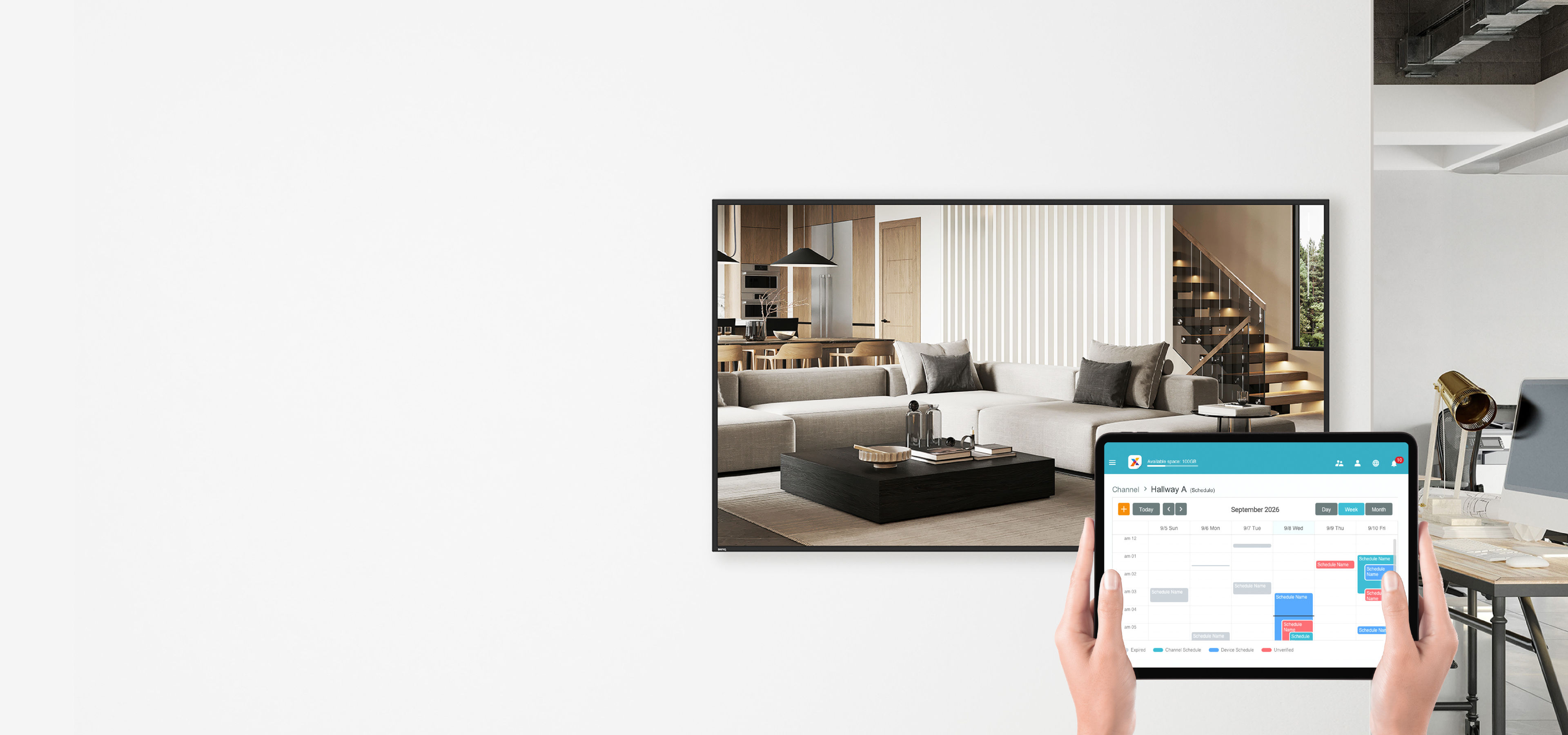 A person using a tablet to manage content on a BenQ digital signage display in a modern lounge area, demonstrating the X-Sign management software for remote content creation and delivery.